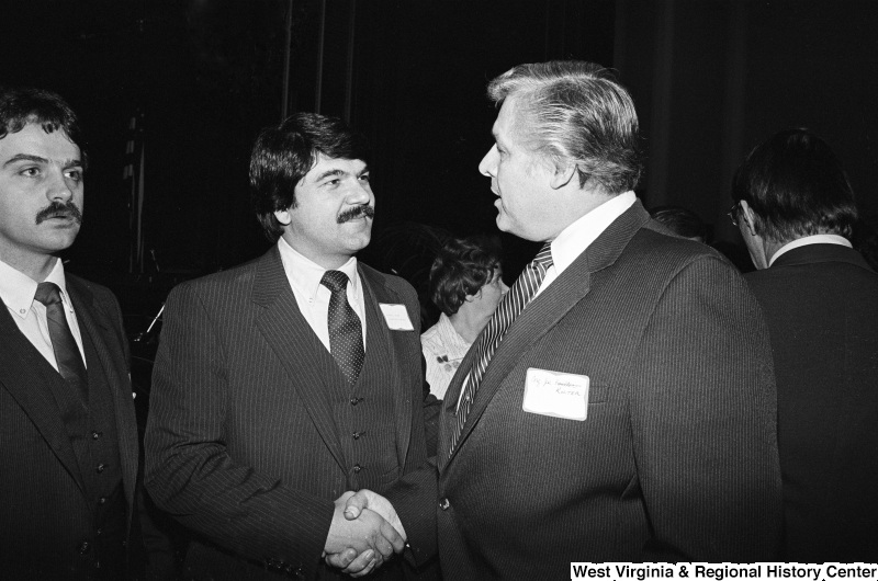 Joseph Kolter shakes hands with Richard Trumka.