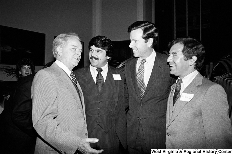 Congressman Rahall, Richard Trumka, Robert Byrd, and another man chat.