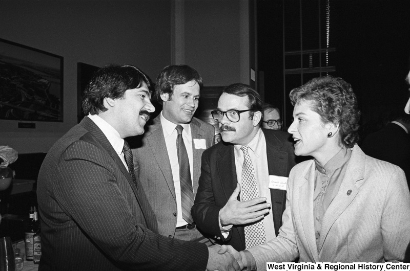 Photograph of Congressman Lane Evans, Congresswoman Marcy Kaptur, Richard Trumka, and others at an event