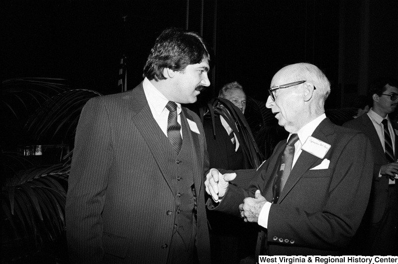 Photograph of Congressman Melvin Price with an unidentified person at an event