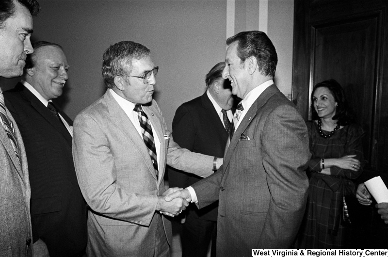 Photograph of actor Danny Thomas with other unidentified people, presumably in the office of Representative Nick Rahall