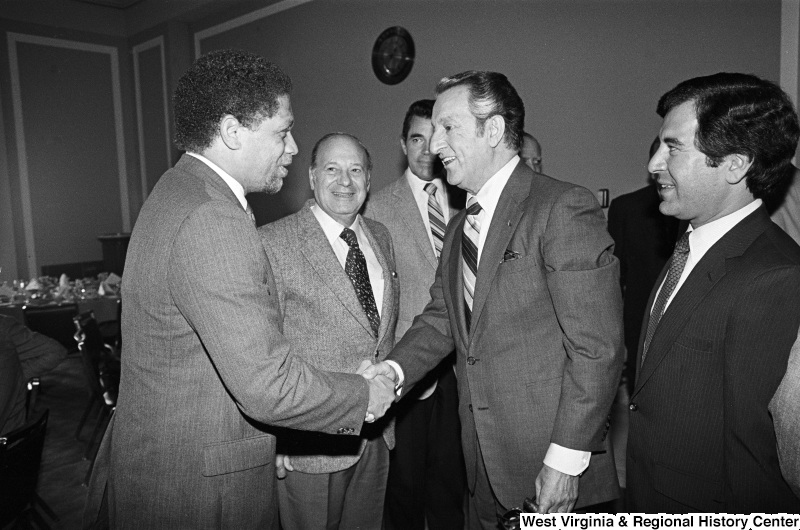 Photograph of Congressmen Mickey Leland (TX), Nick Rahall (WV), and Frank Annunzio (IL) with actor Danny Thomas