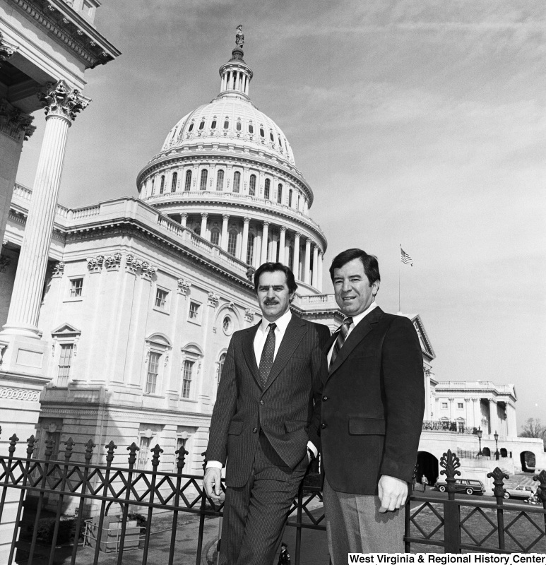 Photograph of Representative Nick Rahall and an unidentified person on the Capitol Building steps