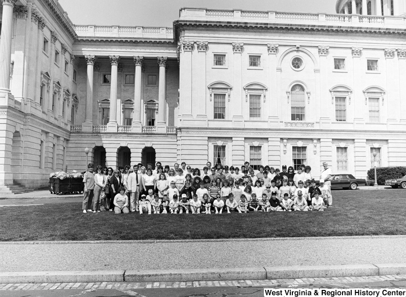Photograph of Congressman Nick Rahall at the Capitol Building with a group of unidentified people