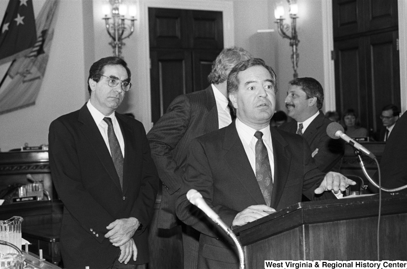 Photograph of Congressmen Nick Rahall, Bruce Vento, George Miller, and Sam Gejdenson speaking at a hearing