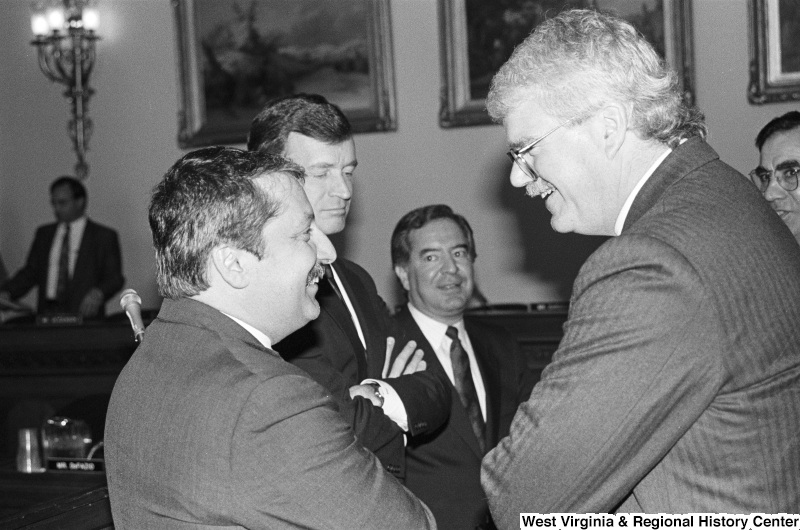 Photograph of Congressmen Nick Rahall, George Miller, Sam Gejdenson, and Peter Kostmayer at an event