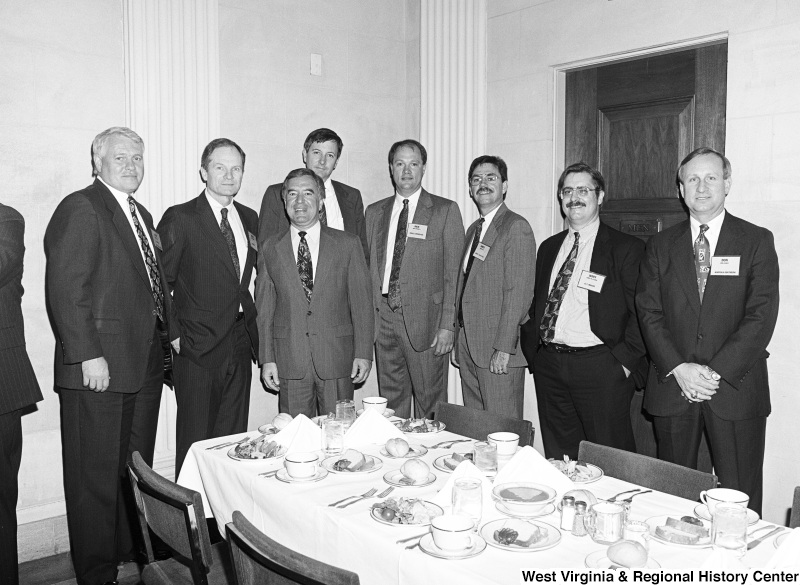 Photograph of Congressman Nick Rahall with Don Seale from Norfolk-Southern, Jerry Syster from A.T. Massey, and five other company representatives