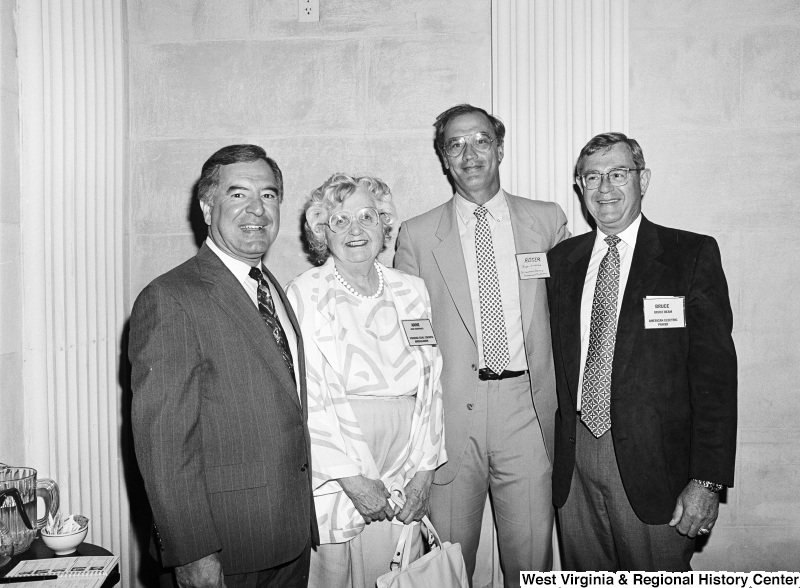 Photograph of Congressman Nick Rahall with Anne Barringer, Virginia Coal Council Ambassador, Roger Sindelat(?) of St. Lawrence Seaway Development Coorporation, and Bruce Beam of American Electric Power.