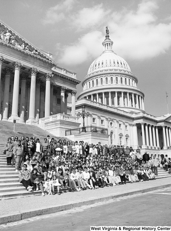 Photograph of Congressman Nick Rahall with an unidentified group outside of the Capitol Building