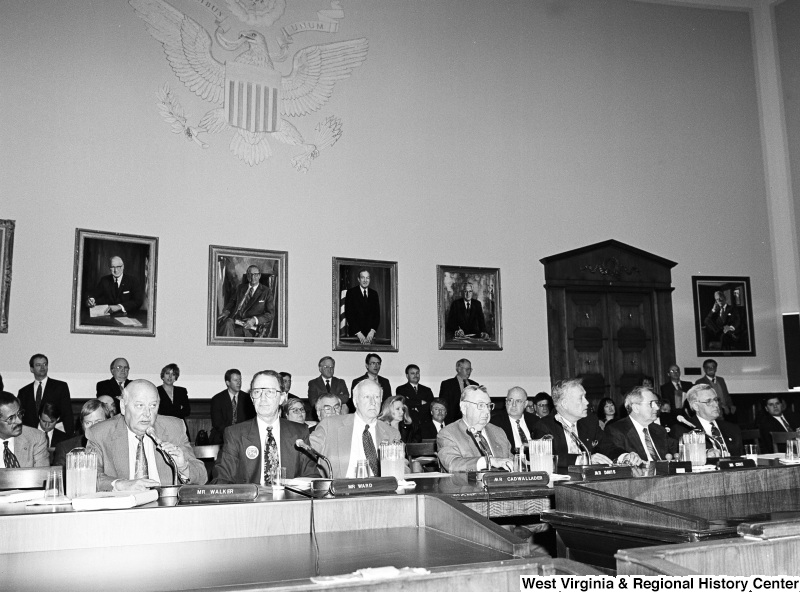 Photograph of Mr. Walker, Mr. Ward, Mr. Cadwallader, Mr. Davis, and Mr. Cole at a board/committee hearing(?)