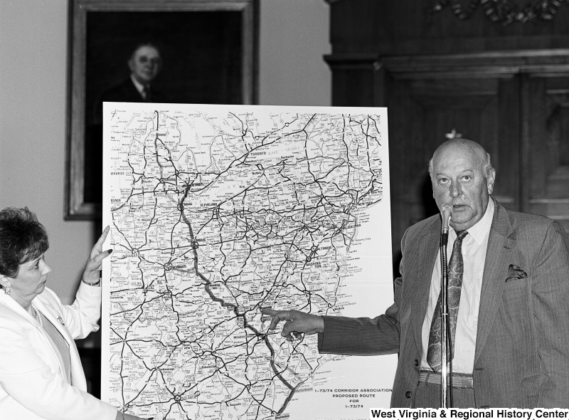 Photograph of an unidentified representative speaking on the proposed route for I-73/74