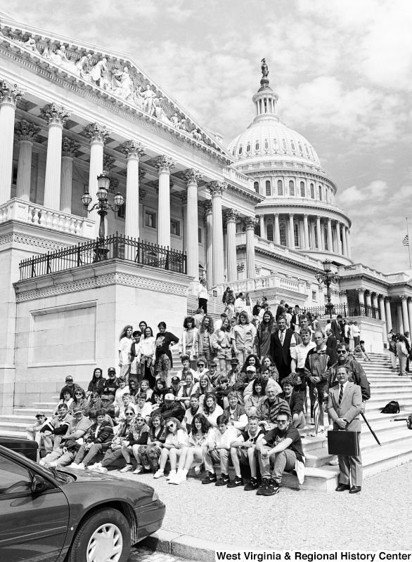 Photograph of a group of unidentified people at the Capitol Building with Congressman Nick Rahall