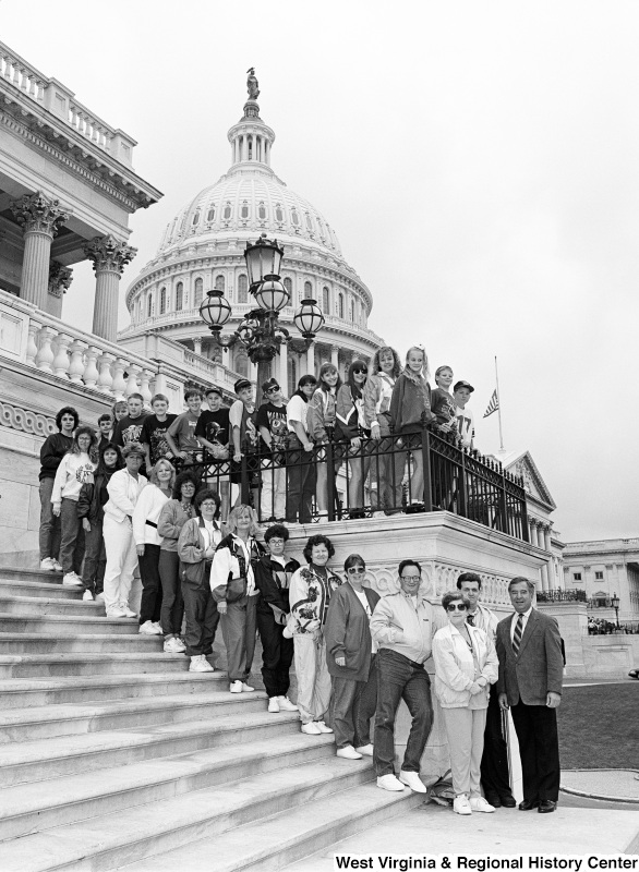 Photograph of Congressman Nick Rahall at the Capitol with an unidentified group of people