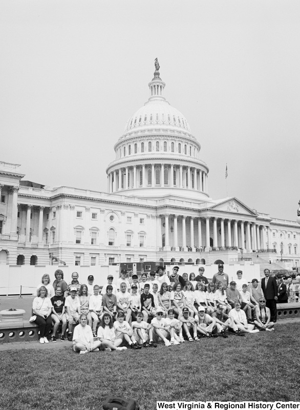 Photograph of Congressman Nick Rahall at the Capitol Building with a group of unidentified students