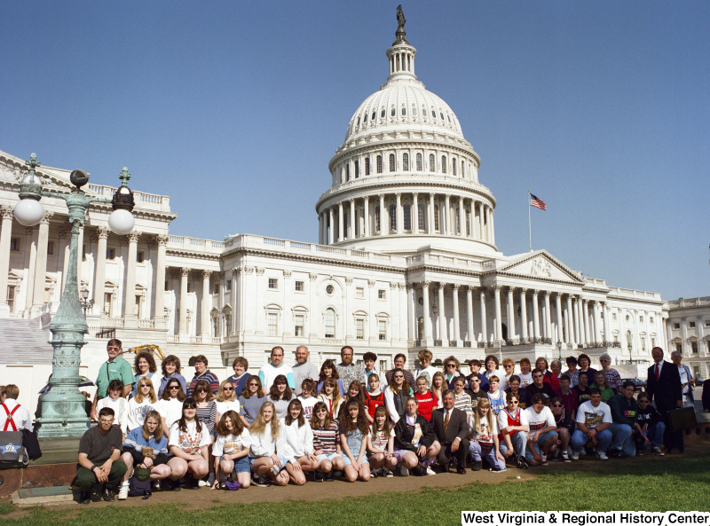 Photograph of Congressman Nick Rahall with a group of unidentified students at the Capitol Building