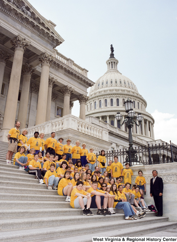 Photograph of Congressman Nick Rahall with a group of students from Bradley Elementary School at the Capitol