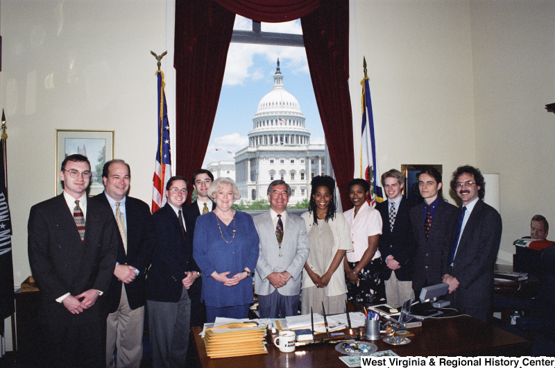 Photograph of Congressman Nick J. Rahall in his office with a group of unidentified people