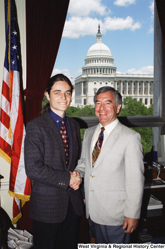 Photograph of Congressman Nick J. Rahall in his office with an unidentified visitor