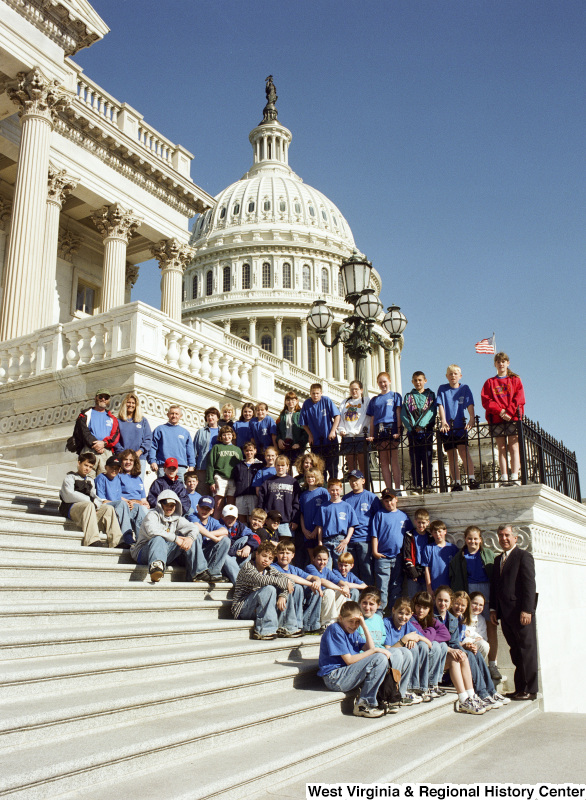 Photograph of Congressman Nick Rahall with students from an unidentified school