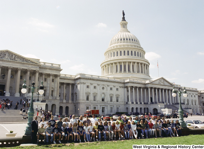 Photograph of Congressman Nick J. Rahall with a group of students from an unidentified school