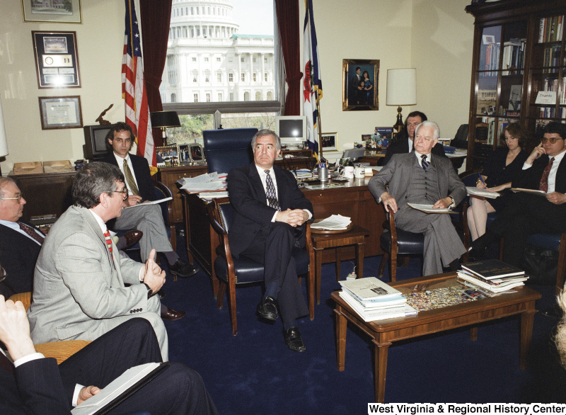 Photograph of Congressman Nick J. Rahall, Senator Robert C. Byrd, and others in a meeting