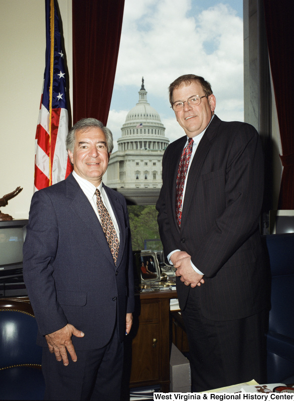 Photograph of Congressman Nick J. Rahall with an unidentified man in his Washington office