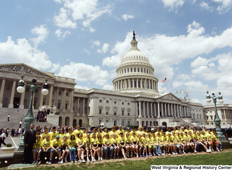 Photograph of Congressman Nick Joe Rahall and students from an unidentified school