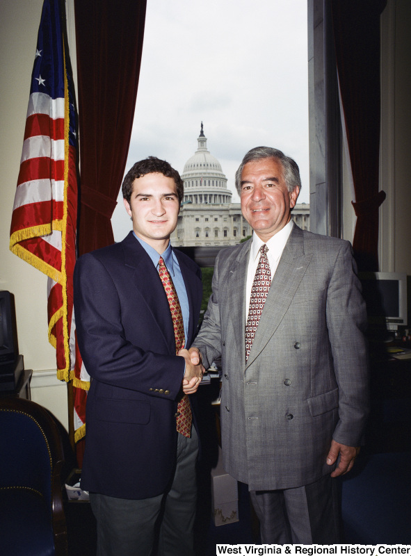 Photograph of Congressman Nick Rahall in his Washington office with an unidentified visitor