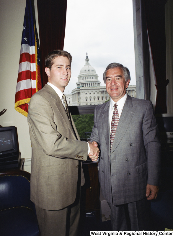 Photograph of Congressman Nick Joe Rahall and an unidentified visitor in his Washington, D.C. office