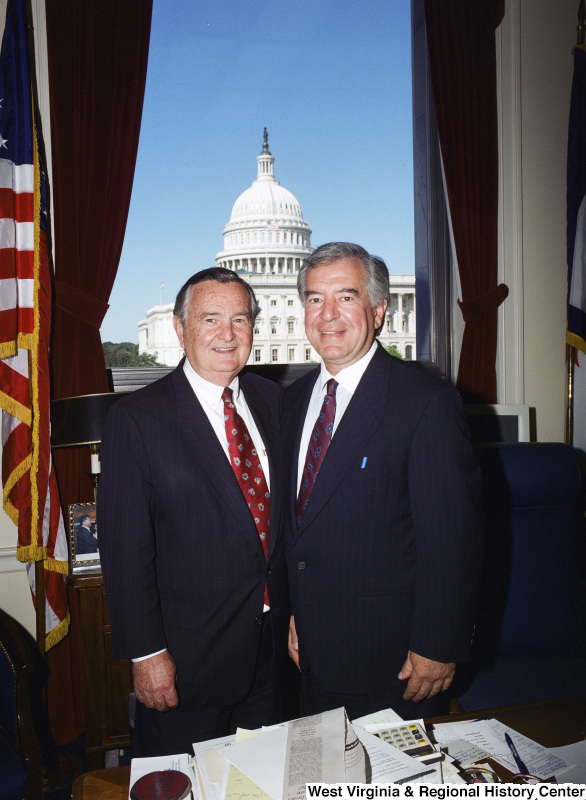 Photograph of an unidentified man visiting with Congressman Nick Joe Rahall