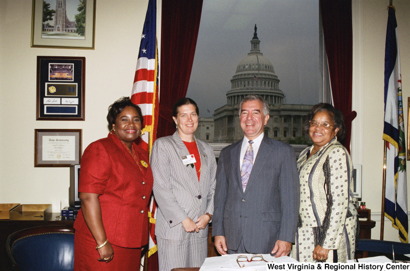 Photograph of Congressman Nick Rahall with State Delegate Barbara Fleischauer and two other woman