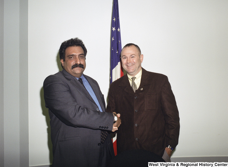 Photograph of Congressman Dana Rohrabacher (CA) with an unidentified man