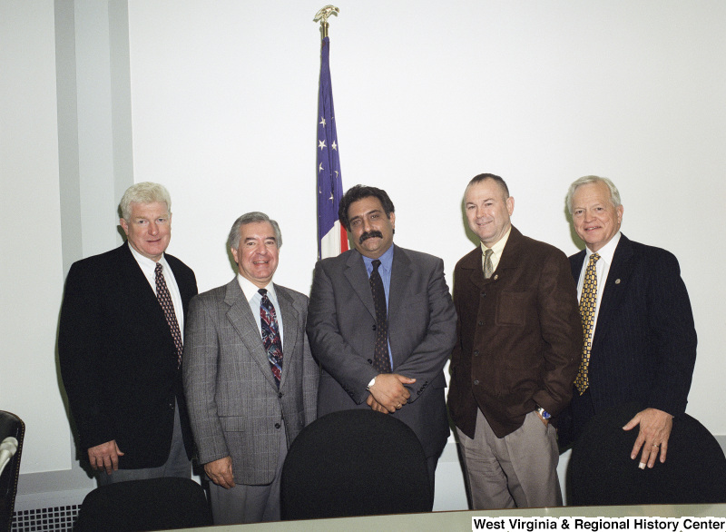 Photograph of Congressmen Nick Rahall, Dana Rohrabacher, and James Moran (VA) with others