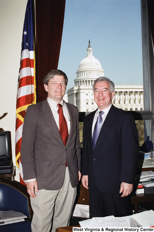 Photograph of Congressman Nick Rahall with an unknown visitor to his Washington office