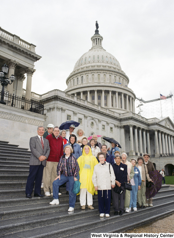 Photograph of Congressman Nick Rahall with a group of elderly people in Washington