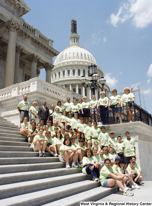 Photograph of Congressman Nick Rahall with unidentified students from Bradley Elementary School