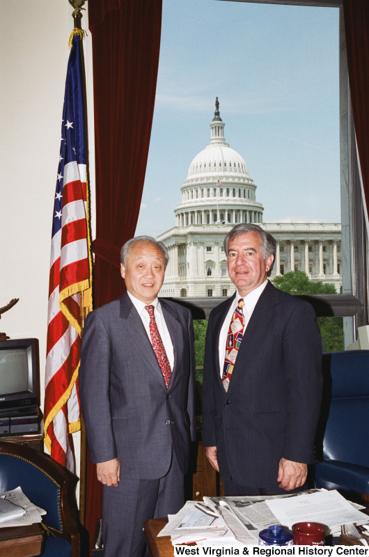 Photograph of Congressman Nick J. Rahall and an unidentified visitor in his Washington office