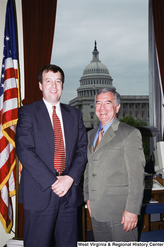 Photograph of Congressman Nick J. Rahall in his office along with an unidentified visitor