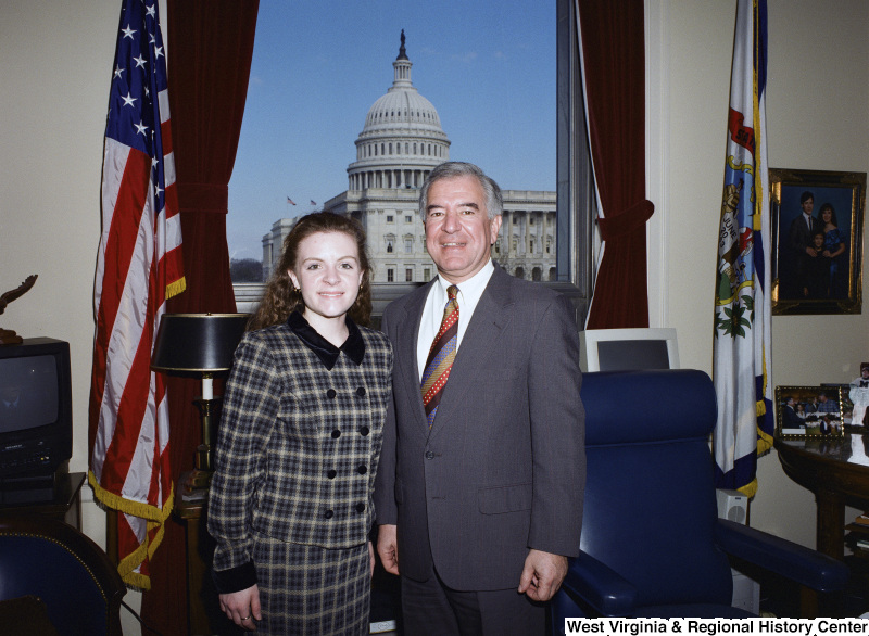 Photograph of Congressman Nick J. Rahall and an unknown female visitor to his Washington office