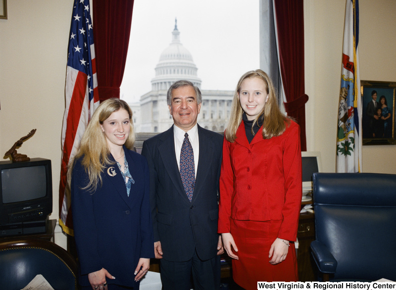 Photograph of Congressman Nick J. Rahall with two unidentified visitors to his Washington office