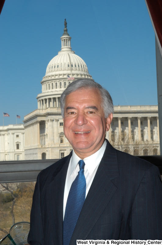 Congressman Rahall stands for a Member portrait photograph.