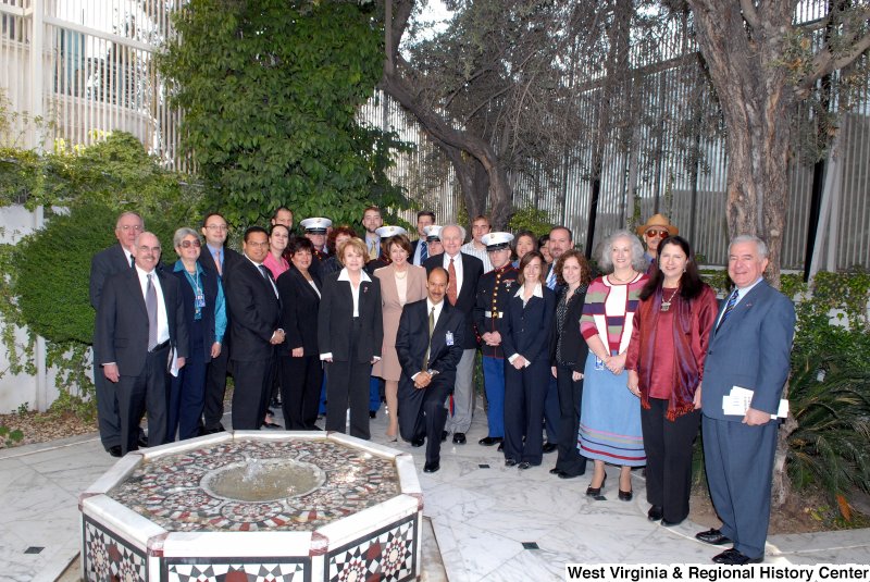 Congressman Rahall, Keith Ellison, Tom Lantos, Nancy Pelosi, Louise Slaughter, Henry Waxman, and others pose behind a fountain during a Congressional Delegation trip to Syria.