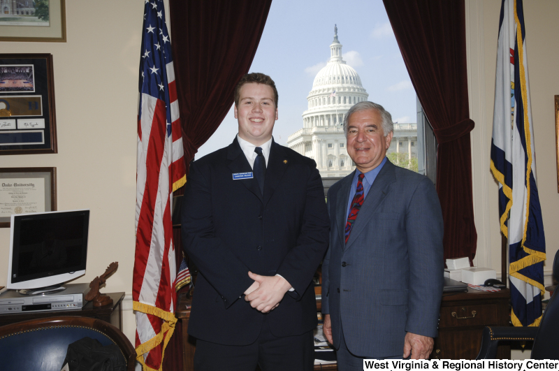 Congressman Rahall in his Washington office stands with Senate Republican Page Cameron Wilson.