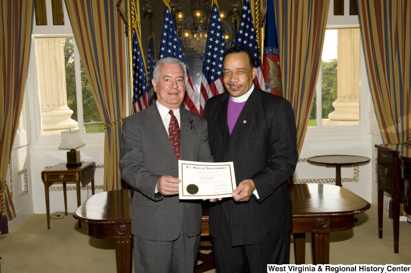 Congressman Rahall presents a certificate to Bishop Fred T. Simms, Heart of God Ministries, Beckley, West Virginia.