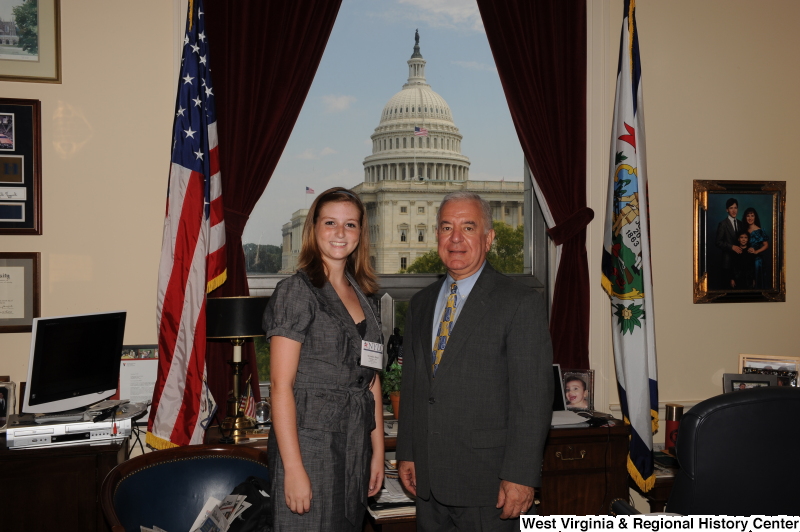 Congressman Rahall stands in his Washington office with Alexandria Rahal, who wears an NYLC badge.