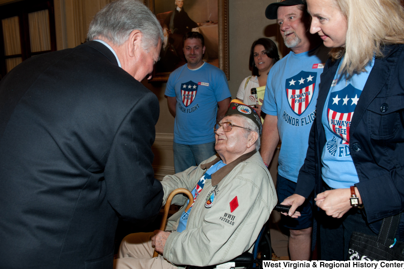 Congressman Rahall meets a World War II veteran at a military award ceremony.