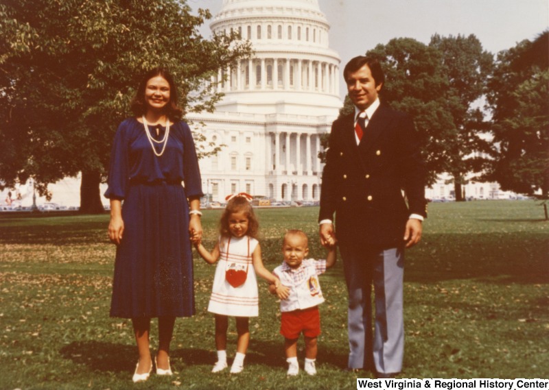 Congressman Nick Rahall II with his first wife, Helen, their daughter, Rebecca, and their son, Nick Rahall III, on the lawn of the Capitol Complex.
