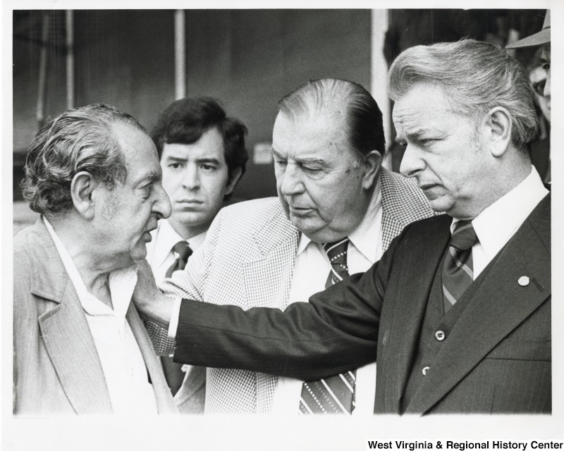 From right to left: Senator Robert C. Byrd, Senator Jennings Randolph, Congressman Nick Rahall II and an unidentified man.