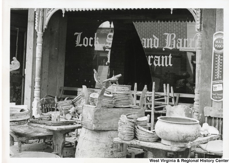 Flood damaged household goods and materials in front of a Lock, Stock, and Barrel store in Mingo County.