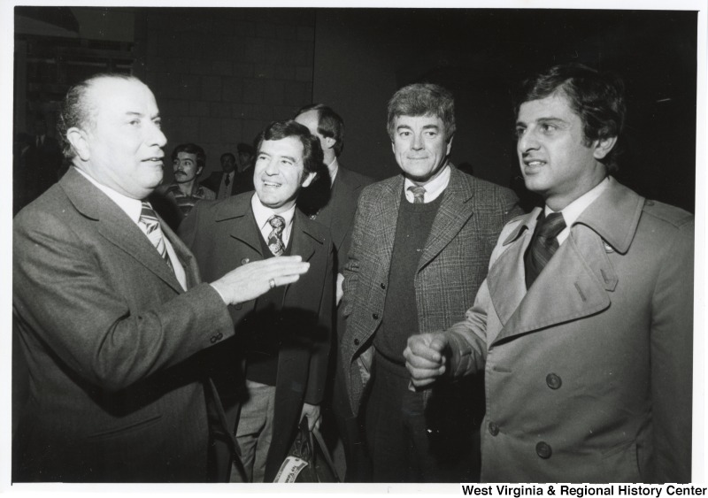 From right to left: Congressman Toby Moffett (D-CT), Congressman Pete McCloskey (R-CA), Congressman Nick Rahall II (D-WV) and the Chairman of the Lebanon Public Works. The Chairman is talking to the three congressman upon their arrival at the Beirut, Lebanon airport.